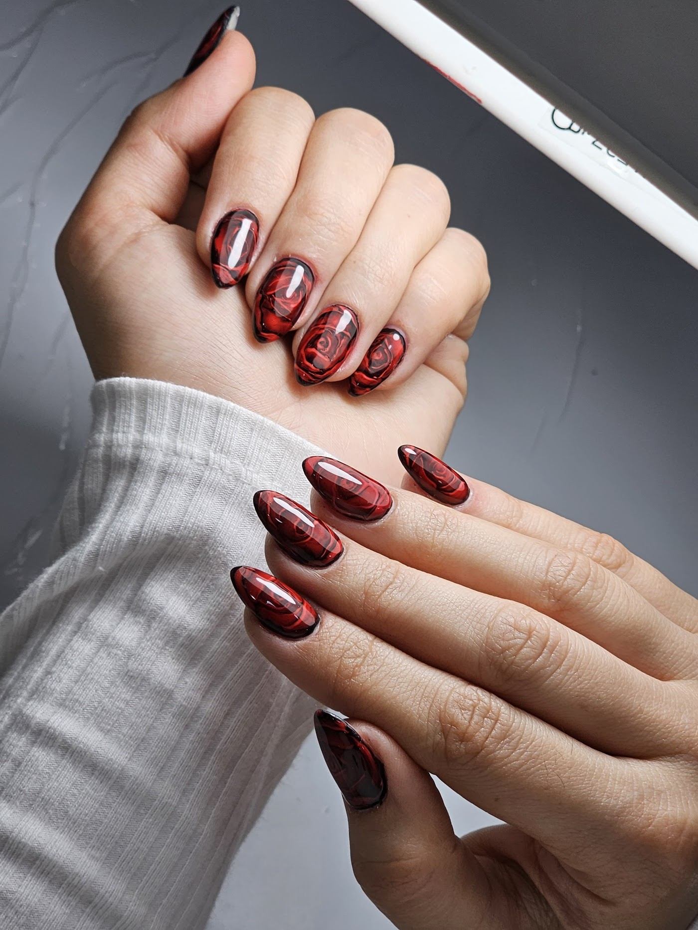 Deep red chrome almond nails